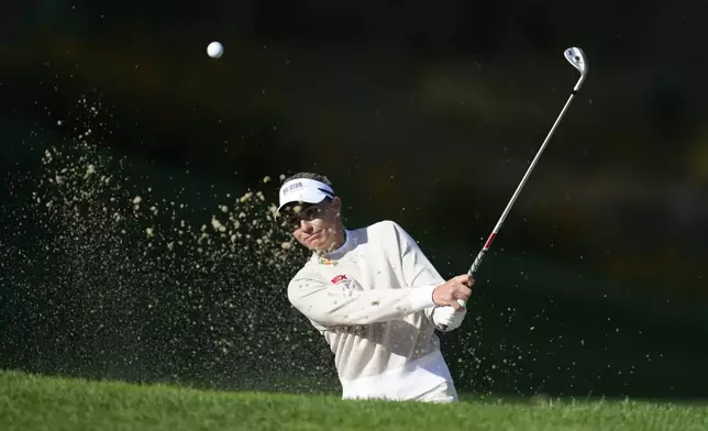 Ryann O'Toole of the United States hits out of a bunker on the 14th green during the final round of the LPGA Ladies Championship golf tournament at the Seowon Valley Country Club in Paju, South Korea, Sunday, Oct. 20, 2024. (AP Photo/Lee Jin-man)