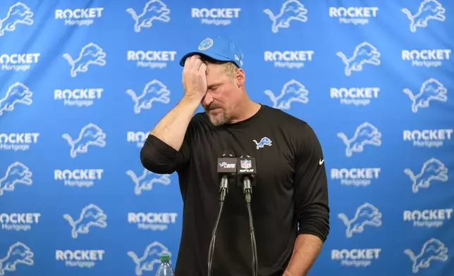 Detroit Lions head coach Dan Campbell reacts as he speaks to the media after an NFL football game against the Tennessee Titans, Sunday, Oct. 27, 2024, in Detroit. (AP Photo/Paul Sancya)