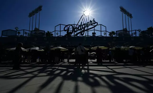 Players set up during media day for the baseball World Series between the Los Angeles Dodgers and the New York Yankees, Thursday, Oct. 24, 2024, in Los Angeles. (AP Photo/Julio Cortez)