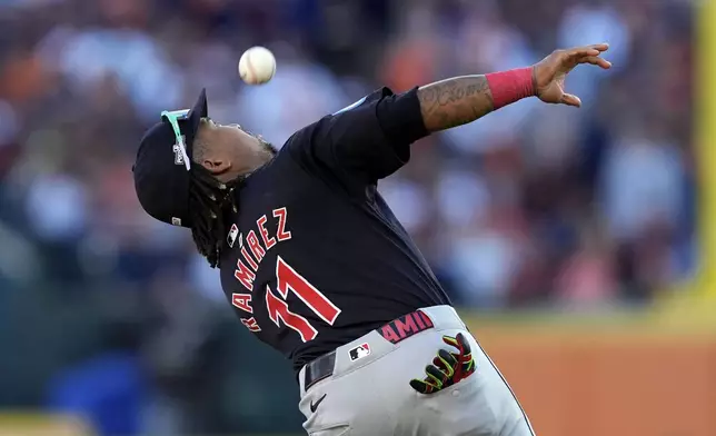 Cleveland Guardians third baseman José Ramírez catches a fly ball hit by Detroit Tigers' Jace Jung in the seventh inning during Game 3 of a baseball American League Division Series, Wednesday, Oct. 9, 2024, in Detroit. (AP Photo/Carlos Osorio)