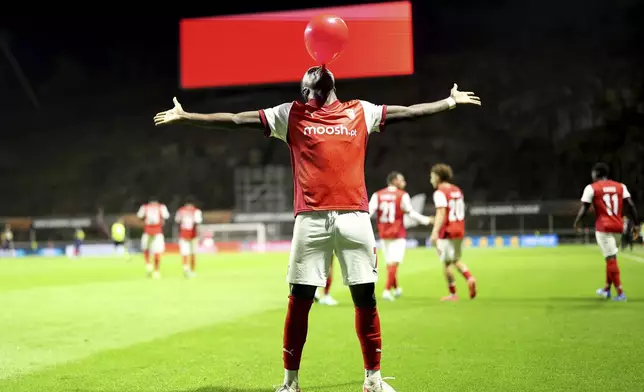 Braga's Bruma celebrates after scoring his side's second goal from the penalty spot during the Europa League opening phase soccer match between SC Braga and Maccabi Tel Aviv at the Municipal stadium in Braga, Portugal, Thursday, Sept. 26, 2024. (AP Photo/Luis Vieira)