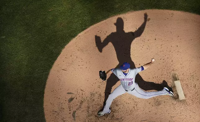 New York Mets' David Peterson pitches during the fourth inning of a baseball game against the Milwaukee Brewers, Sunday, Sept. 29, 2024, in Milwaukee. (AP Photo/Aaron Gash)