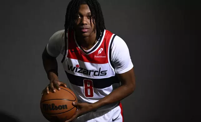 Washington Wizards guard Bub Carrington poses during the NBA basketball team's media day, Monday, Sept. 30, 2024, in Washington. (AP Photo/Nick Wass)