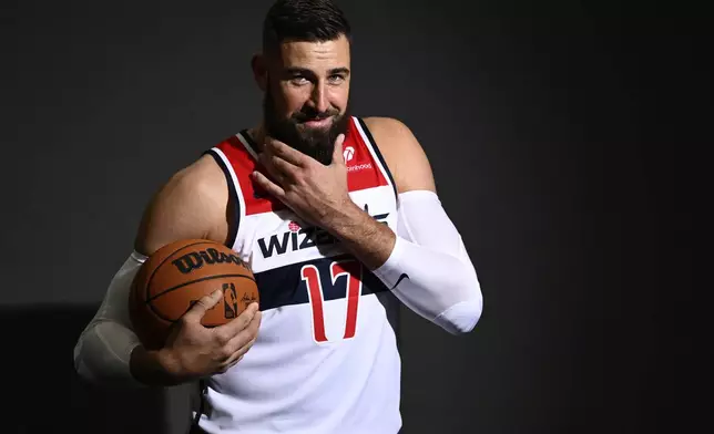 Washington Wizards center Jonas Valanciunas poses during the NBA basketball team's media day, Monday, Sept. 30, 2024, in Washington. (AP Photo/Nick Wass)