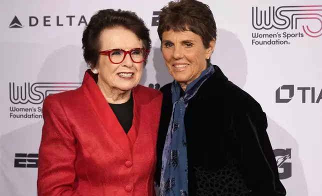 Billie Jean King, left, and Ilana Kloss, right, pose for photos on the red carpet at the Women's Sports Foundation's Annual Salute to Women in Sports, Wednesday, Oct. 16, 2024, in New York. (AP Photo/Pamela Smith)