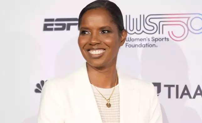 Briana Scurry poses for photos on the red carpet at the Women's Sports Foundation's Annual Salute to Women in Sports, Wednesday, Oct. 16, 2024, in New York. (AP Photo/Pamela Smith)