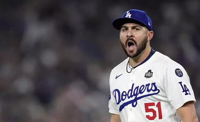 Los Angeles Dodgers pitcher Alex Vesia reacts after striking out New York Yankees' Anthony Rizzo during the eighth inning in Game 1 of the baseball World Series, Friday, Oct. 25, 2024, in Los Angeles. (AP Photo/Godofredo A. Vásquez)