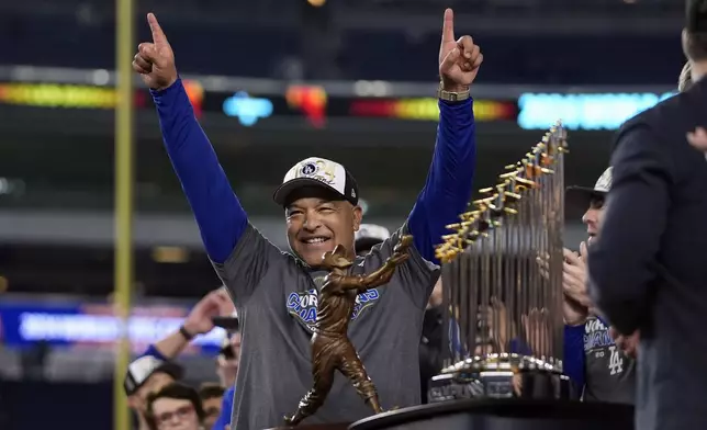 Los Angeles Dodgers manager Dave Roberts celebrates after the Dodgers beat New York Yankees in Game 5 to win the baseball World Series, Thursday, Oct. 31, 2024, in New York. (AP Photo/Godofredo A. Vásquez)