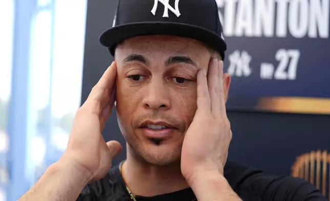 New York Yankees designated hitter Giancarlo Stanton during media day for the baseball World Series against the Los Angeles Dodgers, Thursday, Oct. 24, 2024, in Los Angeles. (AP Photo/Julio Cortez)