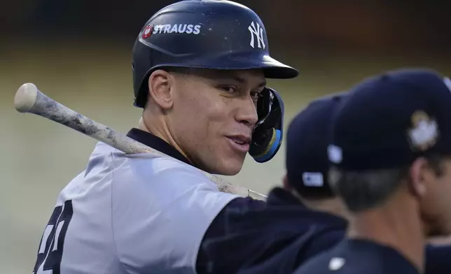 New York Yankees' Aaron Judge watches batting practice during media day for the baseball World Series against the Los Angeles Dodgers, Thursday, Oct. 24, 2024, in Los Angeles. (AP Photo/Julio Cortez)