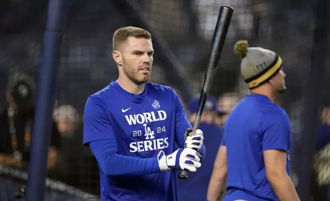 Los Angeles Dodgers' Freddie Freeman waits to hit during batting practice before Game 5 of the baseball World Series against the New York Yankees, Wednesday, Oct. 30, 2024, in New York. (AP Photo/Godofredo A. Vásquez)