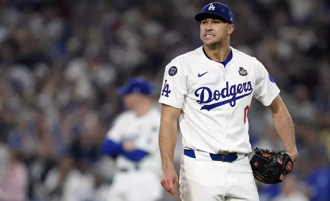 Los Angeles Dodgers' Jack Flaherty reacts after giving up a two-run home run to New York Yankees' Giancarlo Stanton during the sixth inning in Game 1 of the baseball World Series, Friday, Oct. 25, 2024, in Los Angeles. (AP Photo/Godofredo A. Vásquez)