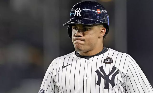 New York Yankees' Juan Soto reacts after flying out against the Los Angeles Dodgers during the eighth inning in Game 3 of the baseball World Series, Monday, Oct. 28, 2024, in New York. (AP Photo/Godofredo A. Vásquez)