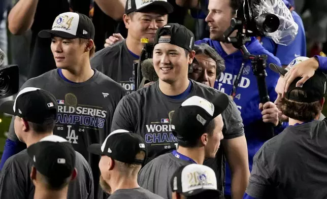 Los Angeles Dodgers' Shohei Ohtani celebrates their win against the New York Yankees in Game 5 to win the baseball World Series, Thursday, Oct. 31, 2024, in New York. (AP Photo/Frank Franklin II)