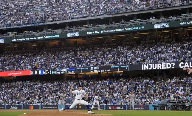 Los Angeles Dodgers starting pitcher Jack Flaherty throws against the New York Yankees during the third inning in Game 1 of the baseball World Series, Friday, Oct. 25, 2024, in Los Angeles. (AP Photo/Godofredo A. Vásquez)