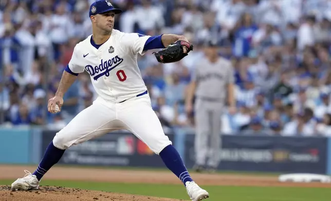 Los Angeles Dodgers starting pitcher Jack Flaherty throws against the New York Yankees during the first inning in Game 1 of the baseball World Series, Friday, Oct. 25, 2024, in Los Angeles. (AP Photo/Godofredo A. Vásquez)