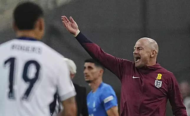 England's manager Lee Carsley reacts during the UEFA Nations League Group F soccer match between Greece and England at Olympic Stadium in Athens, Thursday, Nov. 14, 2024. (AP Photo/Petros Giannakouris)