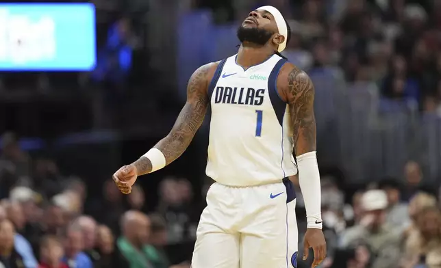 Dallas Mavericks guard Jaden Hardy reacts after a foul call during the first half of an Emirates NBA Cup basketball game against the Denver Nuggets, Friday, Nov. 22, 2024, in Denver. (AP Photo/Jack Dempsey)