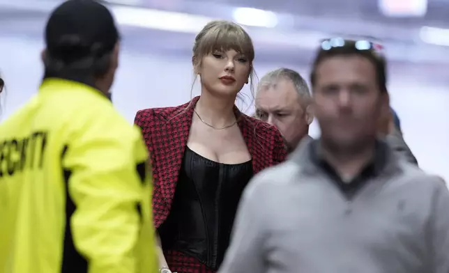 FILE - Taylor Swift arrives before an NFL football game between the Kansas City Chiefs and the Denver Broncos Sunday, Nov. 10, 2024, in Kansas City, Mo. (AP Photo/Ed Zurga, File)