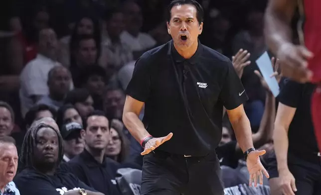 Miami Heat head coach Erik Spoelstra watches from the sideline during the first half of an Emirates NBA Cup basketball game against the Milwaukee Bucks, Tuesday, Nov. 26, 2024, in Miami. (AP Photo/Lynne Sladky)