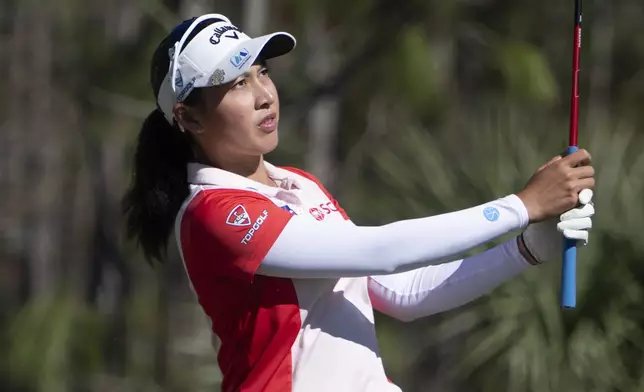 Jeeno Thitikul tees off on the eighth hole during the final round of the LPGA CME Group Tour Championship golf tournament Sunday, Nov. 24, 2024, in Naples, Fla. (AP Photo/Chris Tilley)