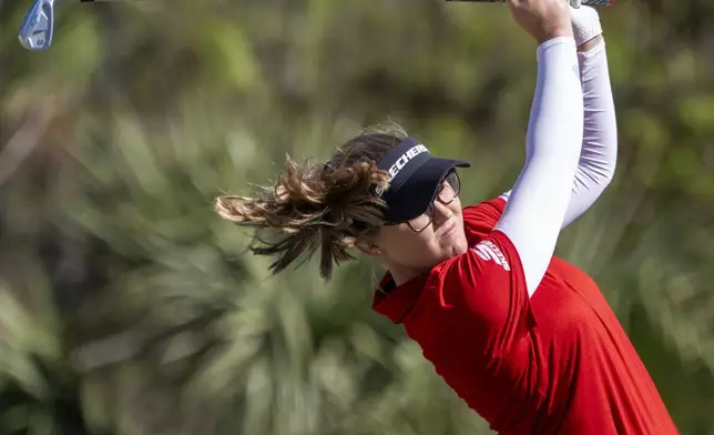 Brooke Henderson tees of on the eighth hole during the final round of the LPGA CME Group Tour Championship golf tournament Sunday, Nov. 24, 2024, in Naples, Fla. (AP Photo/Chris Tilley)