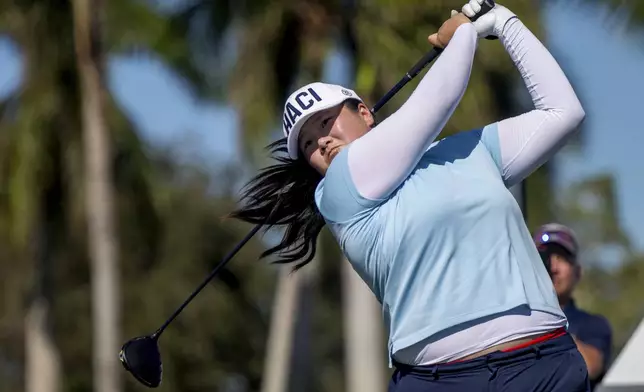 Angel Yin tees off on the ninth hole during the final round of the LPGA CME Group Tour Championship golf tournament Sunday, Nov. 24, 2024, in Naples, Fla. (AP Photo/Chris Tilley)