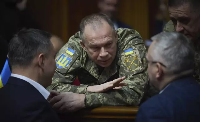 In this photo provided by the Press Service Of The President Of Ukraine on Nov. 19, 2024, Commander-in-Chief of the Armed Forces of Ukraine General Oleksandr Syrskyi speaks to parliamentarians at Verkhovna Rada in Kyiv, Ukraine. (Press Service Of The President Of Ukraine via AP)