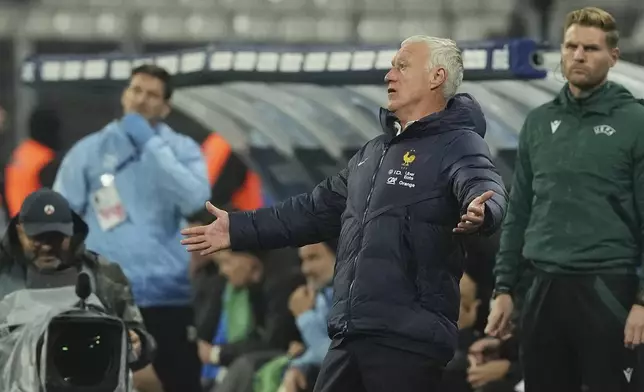 France's coach Didier Deschamps reacts during the UEFA Nations League soccer match between France and Israel at the Stade de France stadium in Saint-Denis, outside Paris, Thursday Nov. 14, 2024. (AP Photo/Thibault Camus)