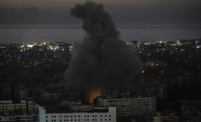 Smoke rises after an Israeli airstrike on Dahiyeh, in the southern suburb of Beirut, Lebanon, Saturday, Nov. 16, 2024. (AP Photo/Bilal Hussein)