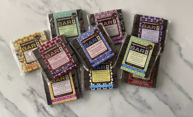 This image from Katie Workman shows an assortment of chocolate bars from Chocopologie. (Katie Workman via AP)