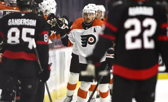 Philadelphia Flyers right wing Travis Konecny (11) celebrates after his goal against the Ottawa Senators during second-period NHL hockey game action in Ottawa, Ontario, Thursday, Nov. 14, 2024. (Justin Tang/The Canadian Press via AP)