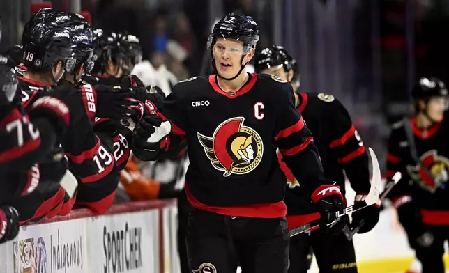 Ottawa Senators left wing Brady Tkachuk (7) celebrates scoring against the Philadelphia Flyersduring the first period of an NHL hockey game, Thursday, Nov. 14, 2024 in Ottawa, Ontario. (Justin Tang/The Canadian Press via AP)