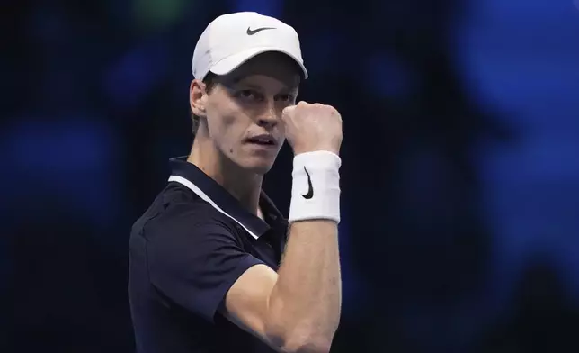 Italy's Jannik Sinner reacts during the singles tennis match of the ATP World Tour Finals against Russia's Daniil Medvedev, at the Inalpi Arena, in Turin, Italy, Thursday, Nov. 14, 2024. (AP Photo/Antonio Calanni)