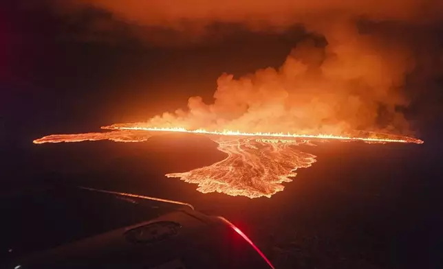 This photograph provided by Civil Protection in Iceland shows a new volcanic eruption that started on the Reykjanes Peninsula in Iceland, Wednesday, Nov.20, 2024. (Civil Protection in Iceland via AP)