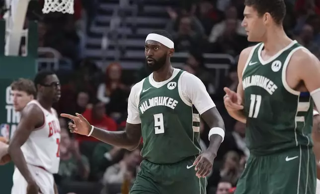 Milwaukee Bucks' Bobby Portis reacts to his three pointer during the first half of an NBA basketball game Wednesday, Nov. 20, 2024, in Milwaukee. (AP Photo/Morry Gash)