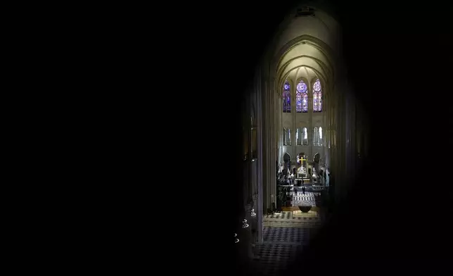 A view of the Notre-Dame cathedral while French President Emmanuel Macron visits the restored interiors monument, Friday, Nov. 29, 2024 in Paris. (Sarah Meyssonnier/Pool via AP)