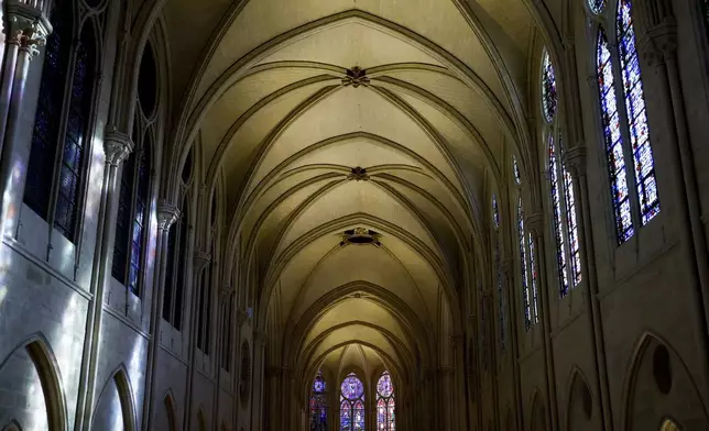 The vaulted ceiling of the Notre-Dame cathedral is seen while French President Emmanuel Macron visits the restored interiors of the monument, Friday, Nov. 29, 2024 in Paris. (Sarah Meyssonnier/Pool via AP)