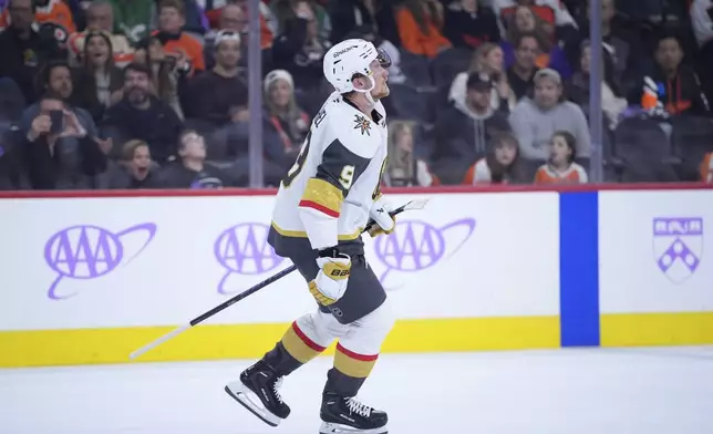 Vegas Golden Knights' Jack Eichel reacts after scoring a goal during a shootout in an NHL hockey game against the Philadelphia Flyers, Monday, Nov. 25, 2024, in Philadelphia. (AP Photo/Matt Slocum)