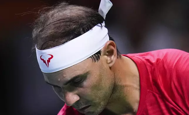 Spain's tennis player Rafael Nadal competes against Netherlands' Botic Van De Zandschulp during a Davis Cup quarterfinal match at Martin Carpena Sports Hall in Malaga, southern Spain, on Tuesday, Nov. 19, 2024. (AP Photo/Manu Fernandez)