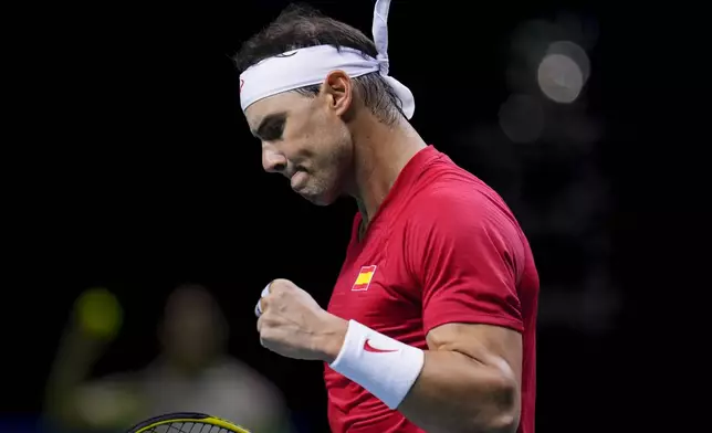 Spain's tennis player Rafael Nadal reacts during a Davis Cup quarterfinal match against Netherlands' Botic Van De Zandschulp at Martin Carpena Sports Hall in Malaga, southern Spain, on Tuesday, Nov. 19, 2024. (AP Photo/Manu Fernandez)