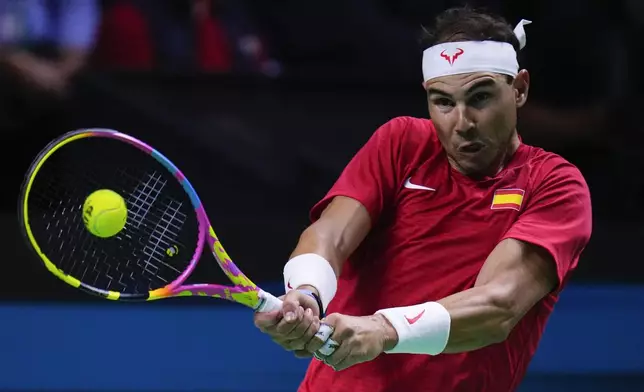 Spain's tennis player Rafael Nadal competes against Netherlands' Botic Van De Zandschulp during a Davis Cup quarterfinal match at Martin Carpena Sports Hall in Malaga, southern Spain, on Tuesday, Nov. 19, 2024. (AP Photo/Manu Fernandez)