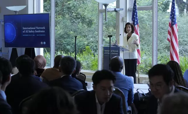 Secretary of Commerce Gina Raimondo speaks at the convening of the International Network of AI Safety Institutes at the Golden Gate Club at the Presidio in San Francisco, Wednesday, Nov. 20, 2024. (AP Photo/Jeff Chiu)