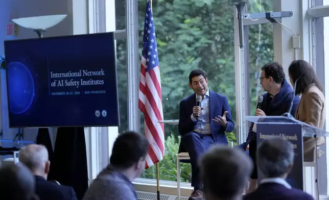 Tino Cuéllar, President of the Carnegie Endowment for International Peace, middle, speaks on a panel with Dario Amodei, CEO &amp; Co-Founder of Anthropic, second from right, and Elizabeth Kelly, Director of the U.S. AI Safety Institute, at the convening of the International Network of AI Safety Institutes at the Golden Gate Club at the Presidio in San Francisco, Wednesday, Nov. 20, 2024. (AP Photo/Jeff Chiu)