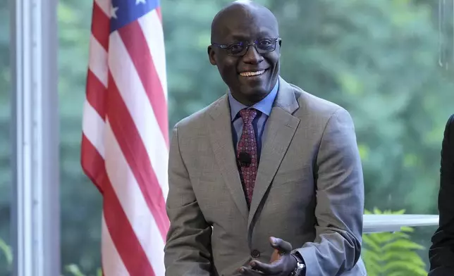 Ambassador Philip Thigo, Special Envoy on Technology for the Office of the President of Kenya, speaks on a panel at the convening of the International Network of AI Safety Institutes at the Golden Gate Club at the Presidio in San Francisco, Wednesday, Nov. 20, 2024. (AP Photo/Jeff Chiu)