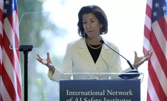 Secretary of Commerce Gina Raimondo speaks at the convening of the International Network of AI Safety Institutes at the Golden Gate Club at the Presidio in San Francisco, Wednesday, Nov. 20, 2024. (AP Photo/Jeff Chiu)