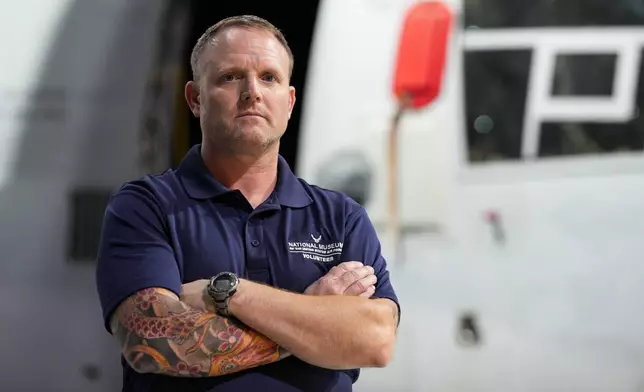 Former Air Force Osprey pilot Brian Luce poses for a portrait inside of the Wright Patterson AFB Air Force Museum, Aug. 9, 2024, in Dayton, Ohio. (AP Photo/Jeff Dean)