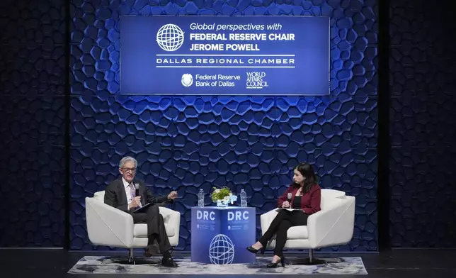 Federal Reserve Chair Jerome Powell, left, speaks to the Dallas Regional Chamber as moderator Catherine Rampell looks during an event in Music Hall at Fair Park Thursday, Nov. 14, 2024, in Dallas. (AP Photo/LM Otero)