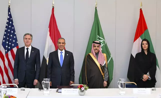 From left : US Secretary of State Antony Blinken, Egypt's Foreign Minister Badr Abdelatty, Foreign Minister of Saudi Arabia Faisal bin Farhan Al-Saud and UAE Minister of State for International Cooperation Reem al-Hashimy pose for a picture during a working session at the G7 Foreign Ministers meeting in Fiuggi, Italy, Monday, Nov. 25, 2024. (Andreas Solaro/Pool Photo via AP)