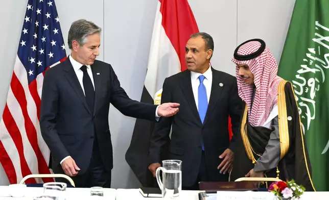 From left : US Secretary of State Antony Blinken, Egypt's Foreign Minister Badr Abdelatty and Foreign Minister of Saudi Arabia Faisal bin Farhan Al-Saud attend a working session at the G7 Foreign Ministers meeting in Fiuggi, Italy, Monday, Nov. 25, 2024. (Andreas Solaro/Pool Photo via AP)